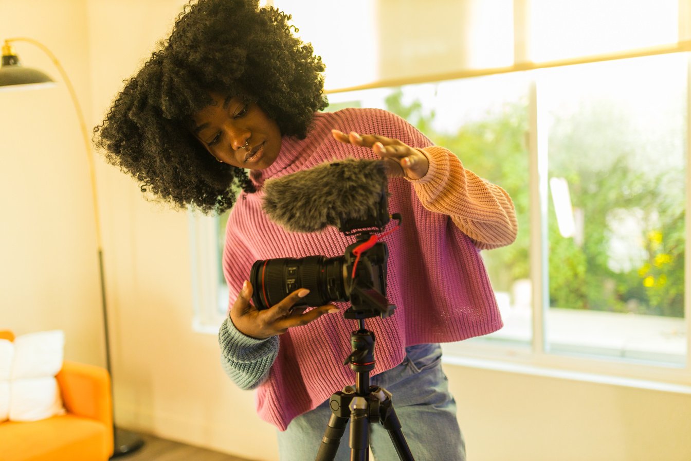 Content Creator Preparing Camera for Shoot